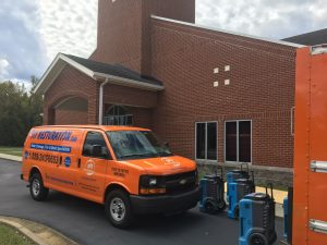 side-angle-water-damage-restoration-van